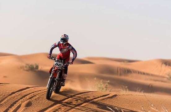 MX rider in the dunes