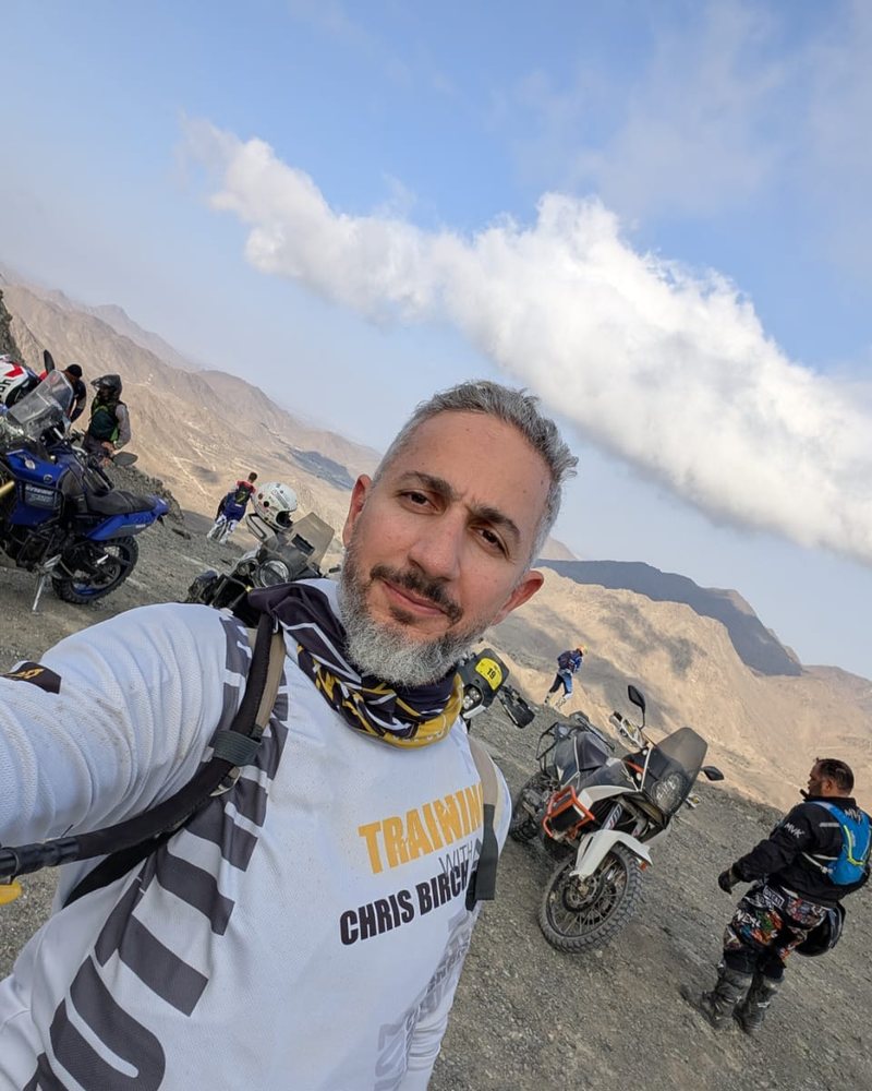 Ahmed taking a selfie on a mountain ride