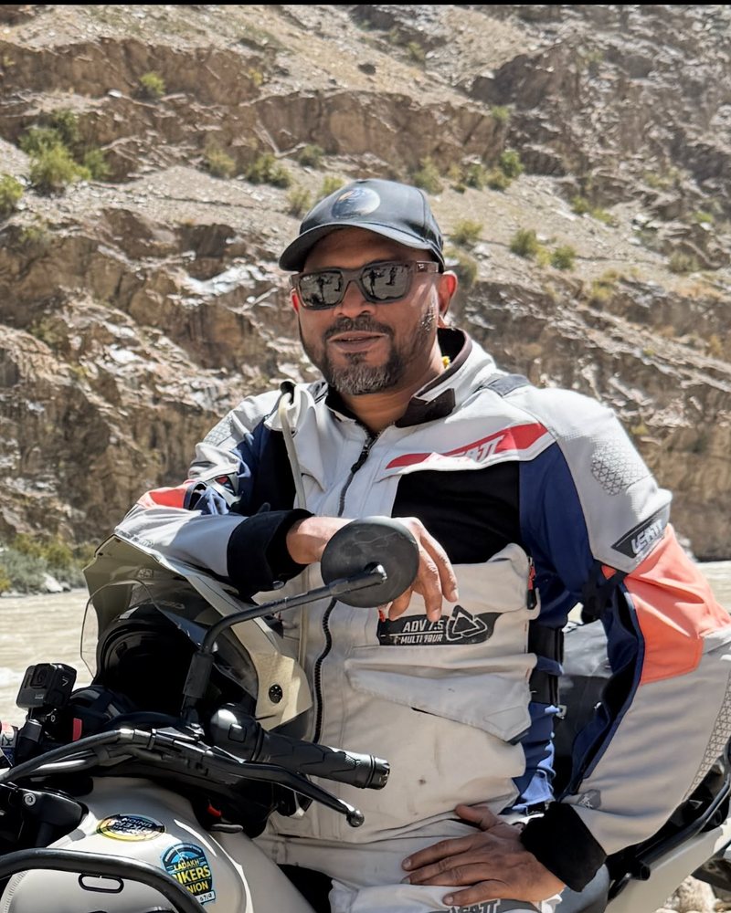 Nazim on his bike in the mountains